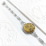 BRACCIALE FERMATEMPO ORO
