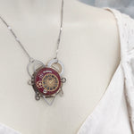 girocollo quadranti vintage oro e bordeaux